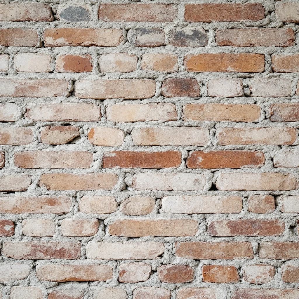 Close-up of bare brick wall showing varied terracotta and cream bricks with light grey mortar joints and surface texture.